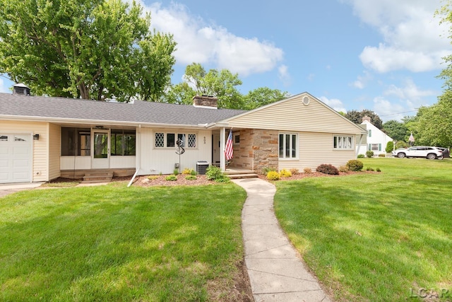 603 Outer Dr, Tecumseh, MI 49286 - single story home featuring a chimney, a front lawn, a sunroom, and board and batten siding