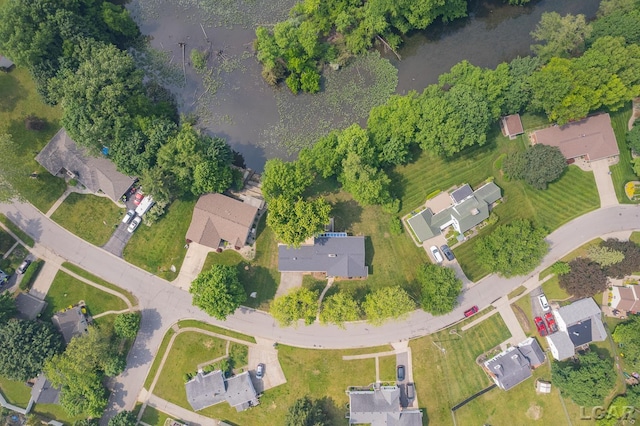 603 Outer Dr, Tecumseh, MI 49286 - aerial view of property's location with nearby suburban area and a nearby body of water