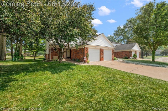 7456 N Kingston Ct, Westland, MI 48185 - view of front facade with brick siding, a garage, a front lawn, and concrete driveway