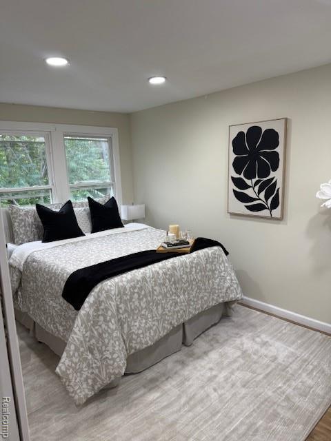 9207 Stout St, Detroit, MI 48228 - bedroom with wood finished floors, baseboards, and recessed lighting