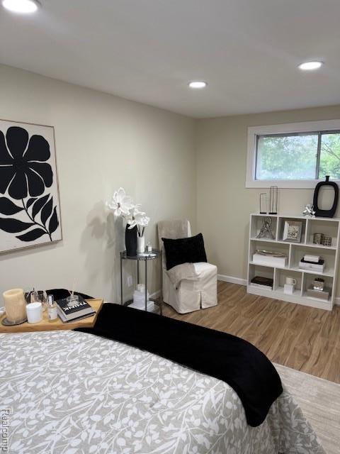 9207 Stout St, Detroit, MI 48228 - bedroom with wood finished floors, recessed lighting, and baseboards
