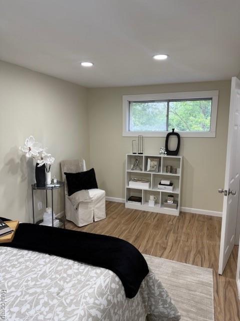 9207 Stout St, Detroit, MI 48228 - bedroom with wood finished floors, baseboards, and recessed lighting