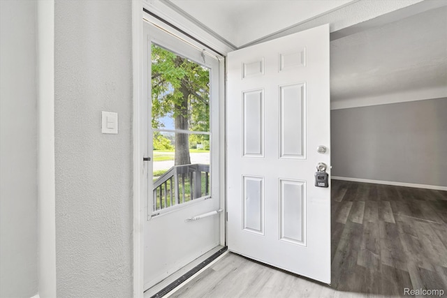 5932 Colorado St, Romulus, MI 48174 - foyer with wood finished floors, a textured wall, and baseboards