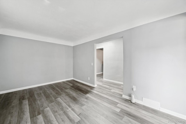 5932 Colorado St, Romulus, MI 48174 - unfurnished room with wood finished floors and baseboards