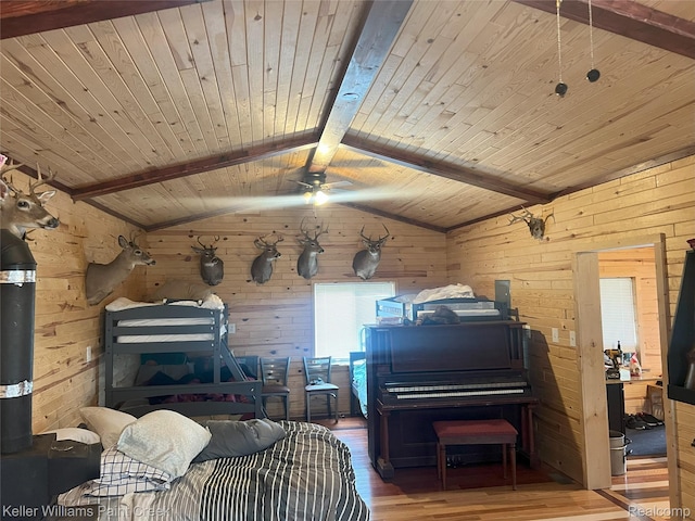11755 Jakob Ln, Lachine, MI 49753 - bedroom with wood finished floors, wood walls, and wood ceiling