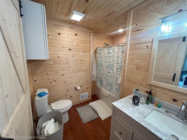 11755 Jakob Ln, Lachine, MI 49753 - full bath with wooden walls, wood ceiling, vanity, wood finished floors, and shower / bath combo
