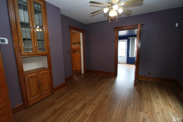 633 Scott St, Monroe, MI 48161 - unfurnished room featuring ceiling fan, light wood-type flooring, and baseboards