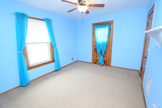 633 Scott St, Monroe, MI 48161 - empty room with carpet floors, ceiling fan, and baseboards