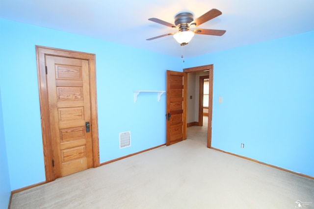 633 Scott St, Monroe, MI 48161 - unfurnished bedroom featuring carpet floors, baseboards, and ceiling fan