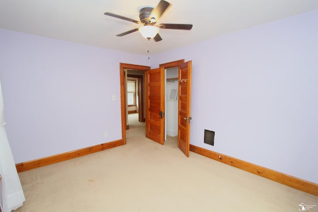 633 Scott St, Monroe, MI 48161 - spare room with light carpet, ceiling fan, and baseboards