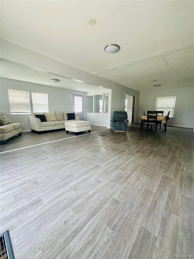 6196 W Plains Rd, Eaton Rapids, MI 48827 - living area with wood finished floors and baseboards