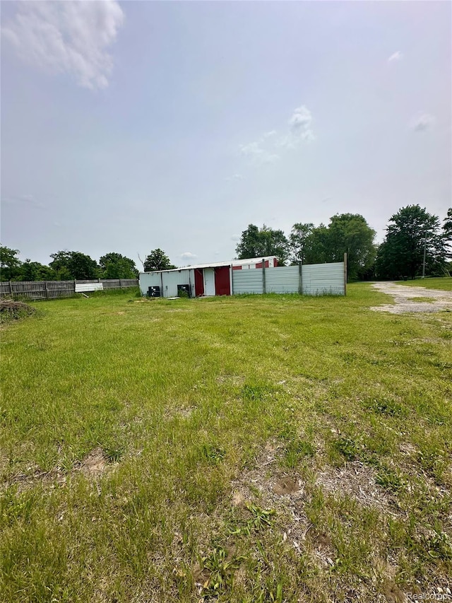 6196 W Plains Rd, Eaton Rapids, MI 48827 - view of yard with a pole building, an outdoor structure, and a detached garage