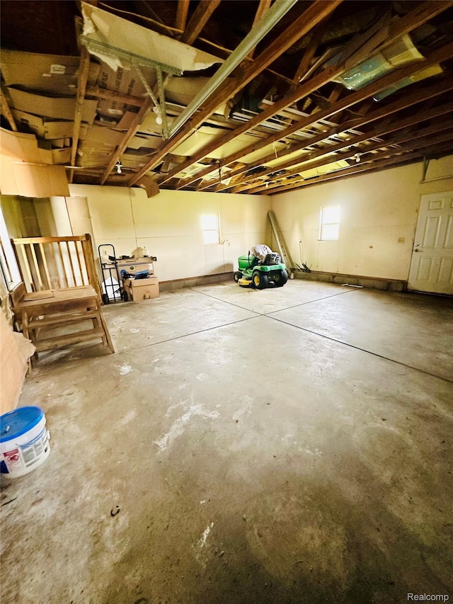 6196 W Plains Rd, Eaton Rapids, MI 48827 - below grade area with a garage