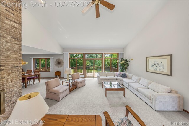 1145 W Moore Rd, Milford, MI 48381 - carpeted living area with high vaulted ceiling and ceiling fan