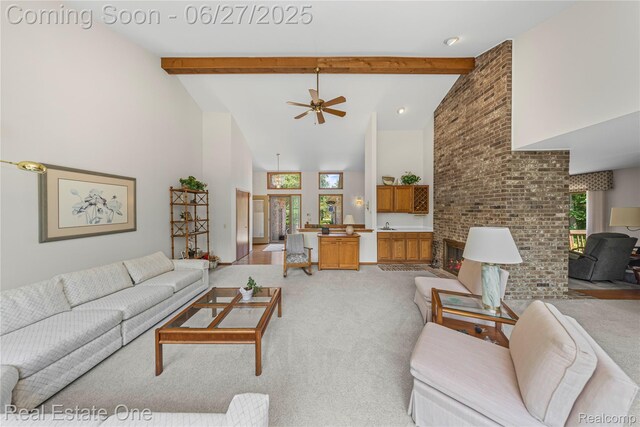 1145 W Moore Rd, Milford, MI 48381 - living area with high vaulted ceiling, plenty of natural light, light carpet, beamed ceiling, and ceiling fan