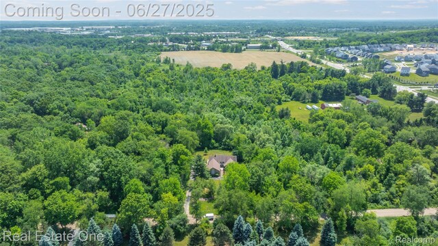 1145 W Moore Rd, Milford, MI 48381 - aerial view of a forest