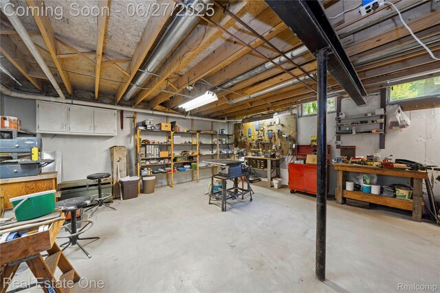 1145 W Moore Rd, Milford, MI 48381 - basement featuring a workshop area