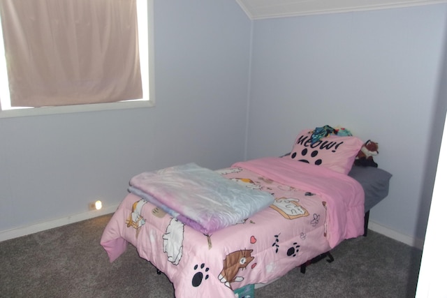 602 Fairview Ave, Manistee, MI 49660 - carpeted bedroom featuring ornamental molding and baseboards