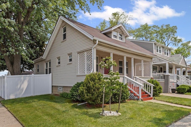809 E Bennett Ave, Ferndale, MI 48220 - view of front facade featuring a porch, roof with shingles, and stairs