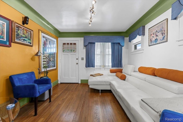 809 E Bennett Ave, Ferndale, MI 48220 - living room with wood-type flooring, baseboards, and track lighting
