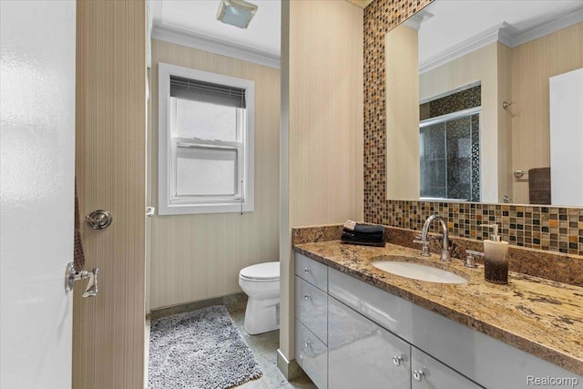 809 E Bennett Ave, Ferndale, MI 48220 - bathroom with ornamental molding, vanity, toilet, a shower with door, and baseboards