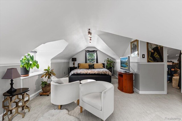 809 E Bennett Ave, Ferndale, MI 48220 - carpeted bedroom with vaulted ceiling and baseboards