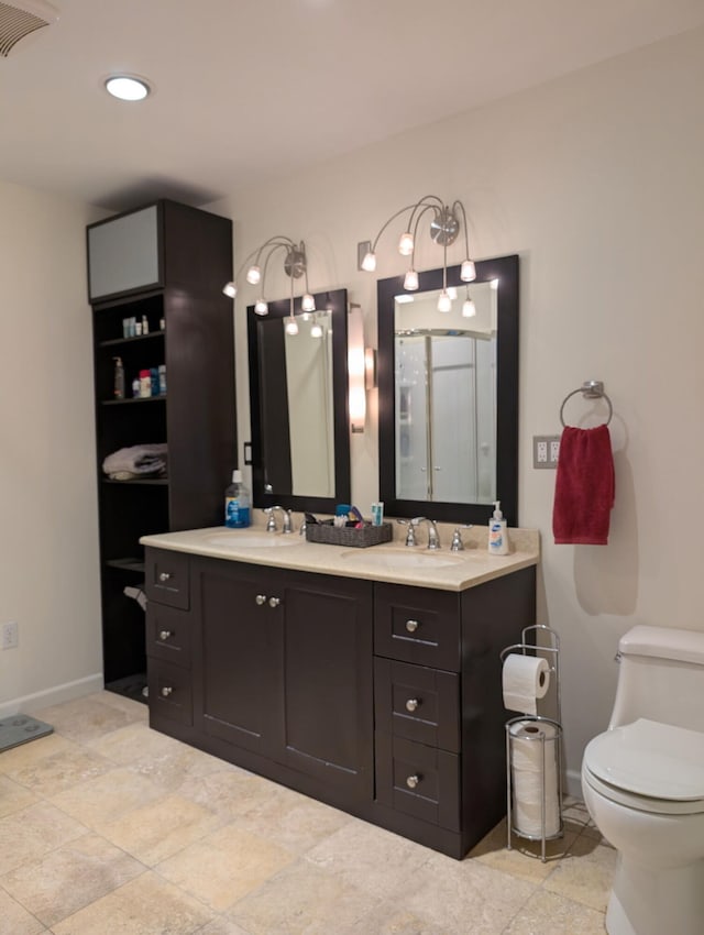 26314 E St, Saint Clair Shores, MI 48081 - bathroom with double vanity, toilet, and baseboards