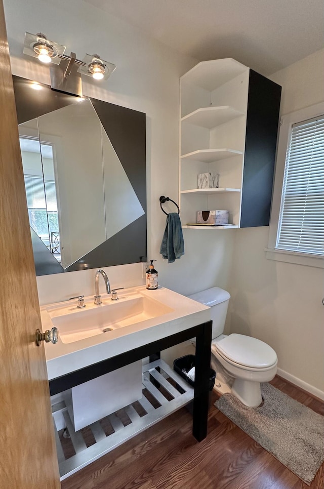 26314 E St, Saint Clair Shores, MI 48081 - bathroom with toilet, wood finished floors, vanity, and baseboards