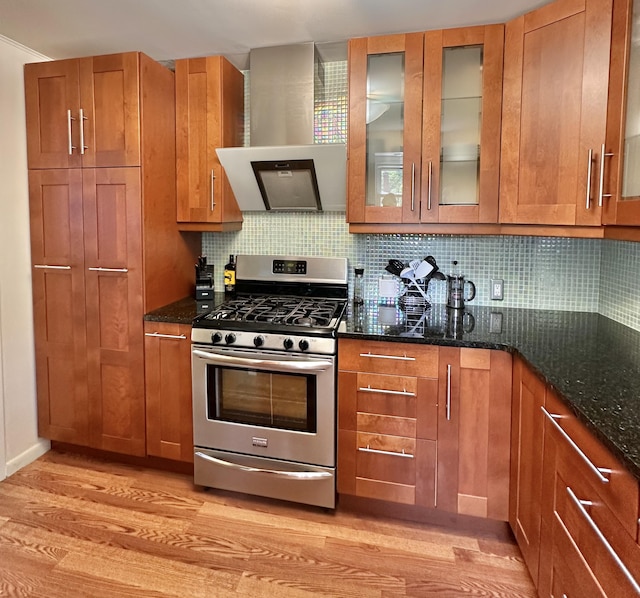 26314 E St, Saint Clair Shores, MI 48081 - kitchen with stainless steel range with gas cooktop, light wood finished floors, brown cabinetry, and backsplash