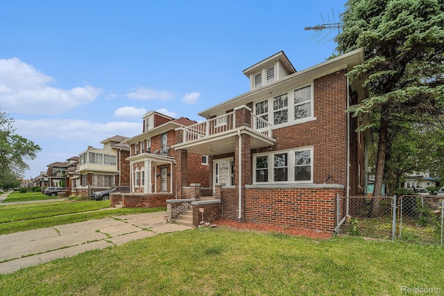 74 W Dakota, Highland Park, MI 48203 - view of front of house with a balcony and brick siding