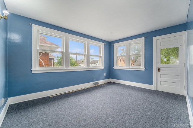 74 W Dakota, Highland Park, MI 48203 - spare room with carpet floors and baseboards