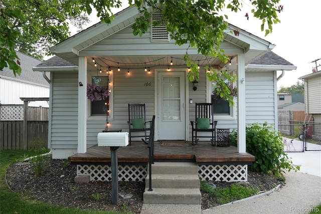 106 S Marias Ave, Clawson, MI 48017 - view of front of home with roof with shingles and a porch