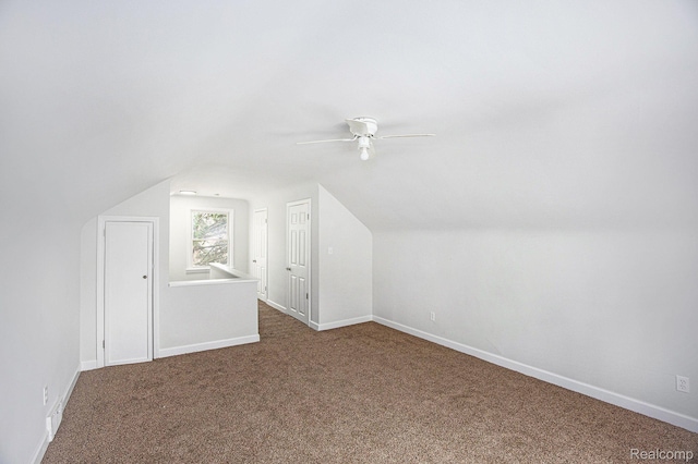 20265 Yonka St, Detroit, MI 48234 - bonus room with vaulted ceiling, carpet floors, ceiling fan, and baseboards