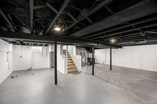 20265 Yonka St, Detroit, MI 48234 - below grade area featuring stairs and water heater