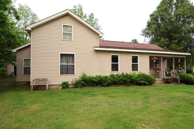 113 S Park St, Union City, MI 49094 - back of property with a yard and covered porch