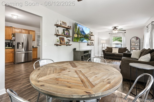 6287 Woodring Ct, Brighton, MI 48116 - dining room featuring a ceiling fan and dark wood-type flooring