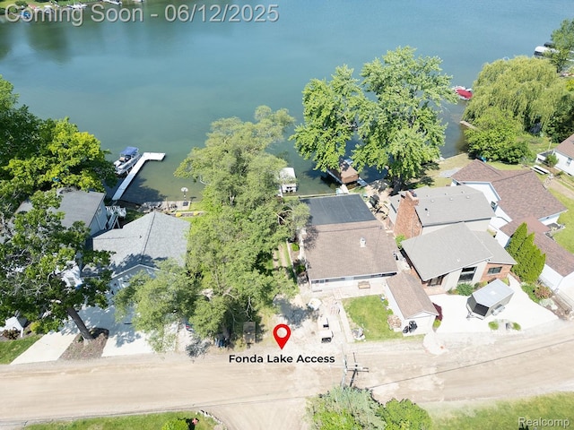 6287 Woodring Ct, Brighton, MI 48116 - aerial view of property and surrounding area with nearby suburban area and a nearby body of water