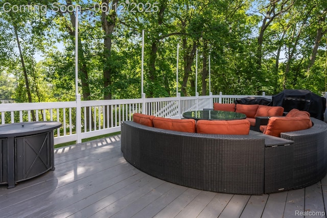 6287 Woodring Ct, Brighton, MI 48116 - wooden terrace with outdoor lounge area