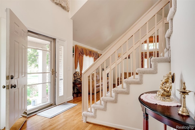 39719 Squire Rd, Novi, MI 48375 - entryway featuring stairway and wood finished floors