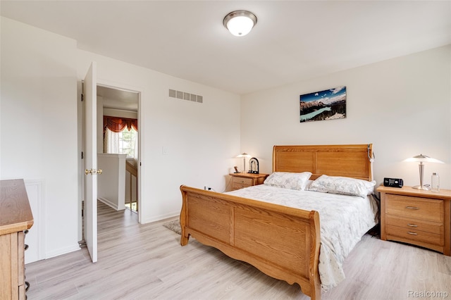 39719 Squire Rd, Novi, MI 48375 - bedroom with light wood-style flooring and baseboards