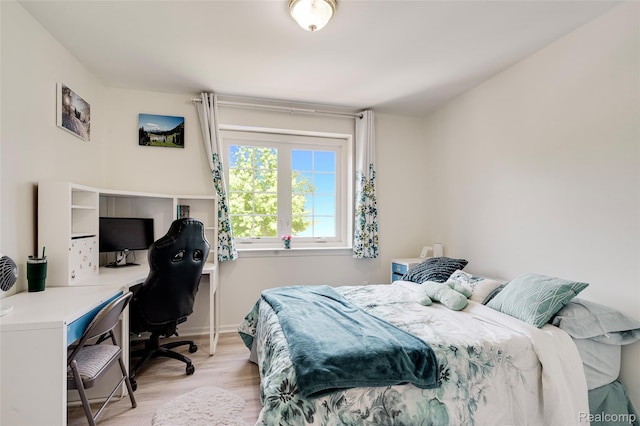 39719 Squire Rd, Novi, MI 48375 - bedroom with light wood-style flooring, a desk, and baseboards