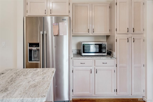 39719 Squire Rd, Novi, MI 48375 - kitchen featuring stainless steel appliances and light stone countertops
