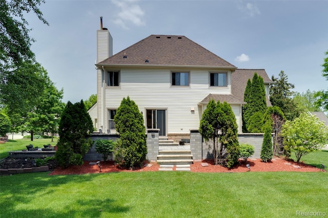 39719 Squire Rd, Novi, MI 48375 - back of house with a chimney, a lawn, and a shingled roof