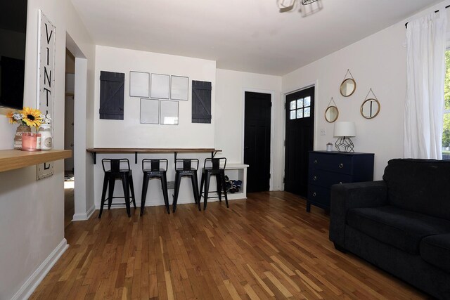 600 Center Dr, Tecumseh, MI 49286 - living room featuring hardwood / wood-style flooring and baseboards