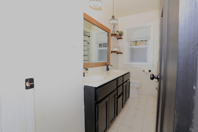 600 Center Dr, Tecumseh, MI 49286 - full bathroom with double vanity and tile patterned floors