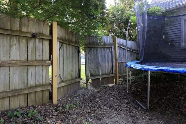 600 Center Dr, Tecumseh, MI 49286 - view of yard featuring a trampoline