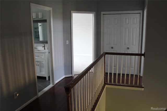 300 Crestway Ct, Saline, MI 48176 - hall with wood finished floors and an upstairs landing