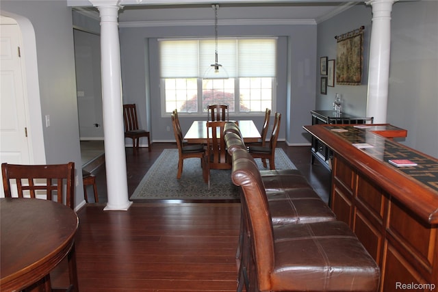 300 Crestway Ct, Saline, MI 48176 - dining space featuring ornate columns, dark wood-type flooring, ornamental molding, and arched walkways