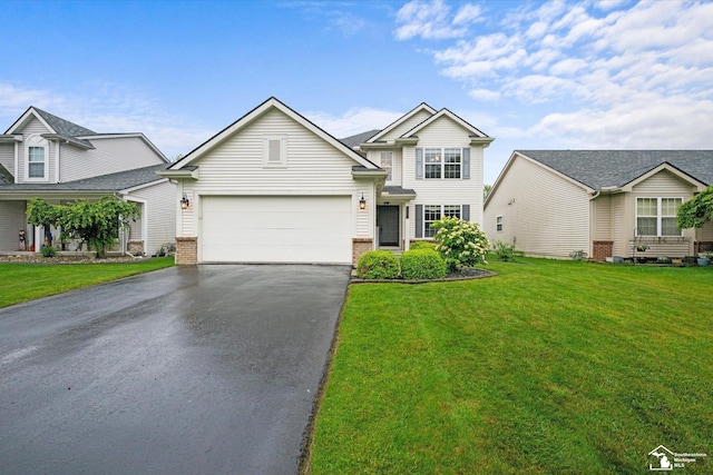 773 Hunting Creek Rd, Temperance, MI 48182 - traditional-style house featuring asphalt driveway, a front yard, a garage, and brick siding