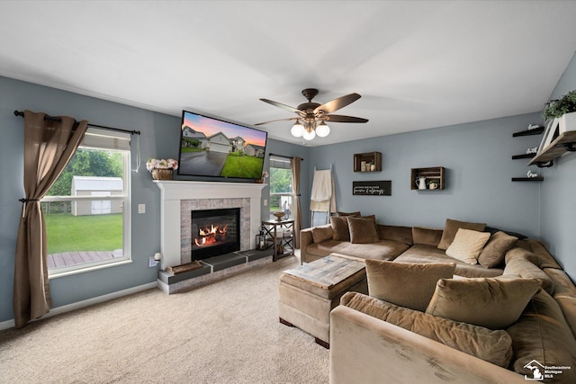 773 Hunting Creek Rd, Temperance, MI 48182 - carpeted living room with plenty of natural light, a glass covered fireplace, ceiling fan, and baseboards